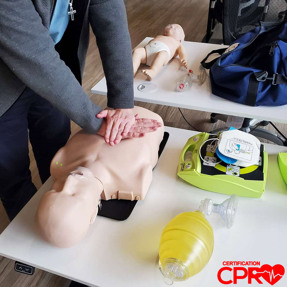 CPR training on mannequin for certification in Lakeland.