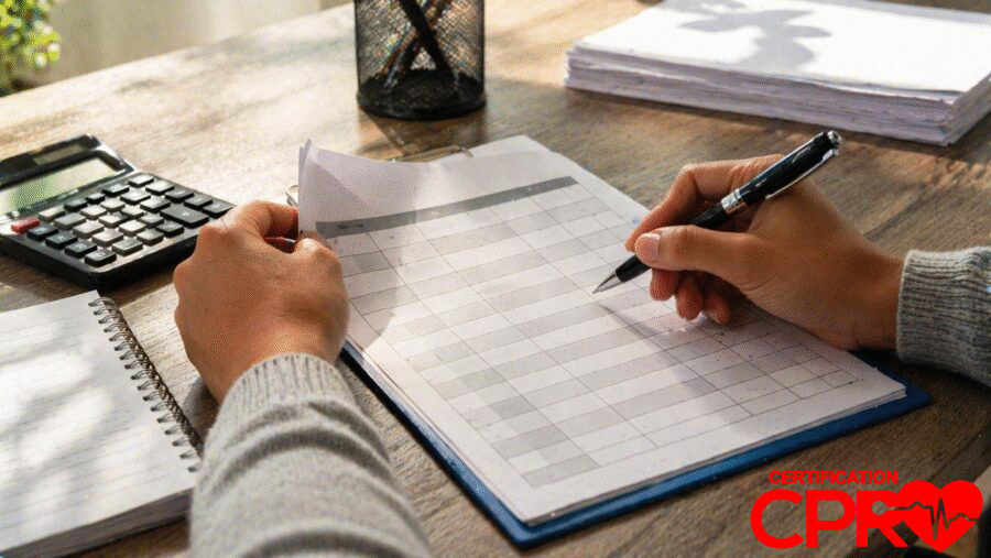 Person filling out a form for CPR certification in Lakeland, Florida.